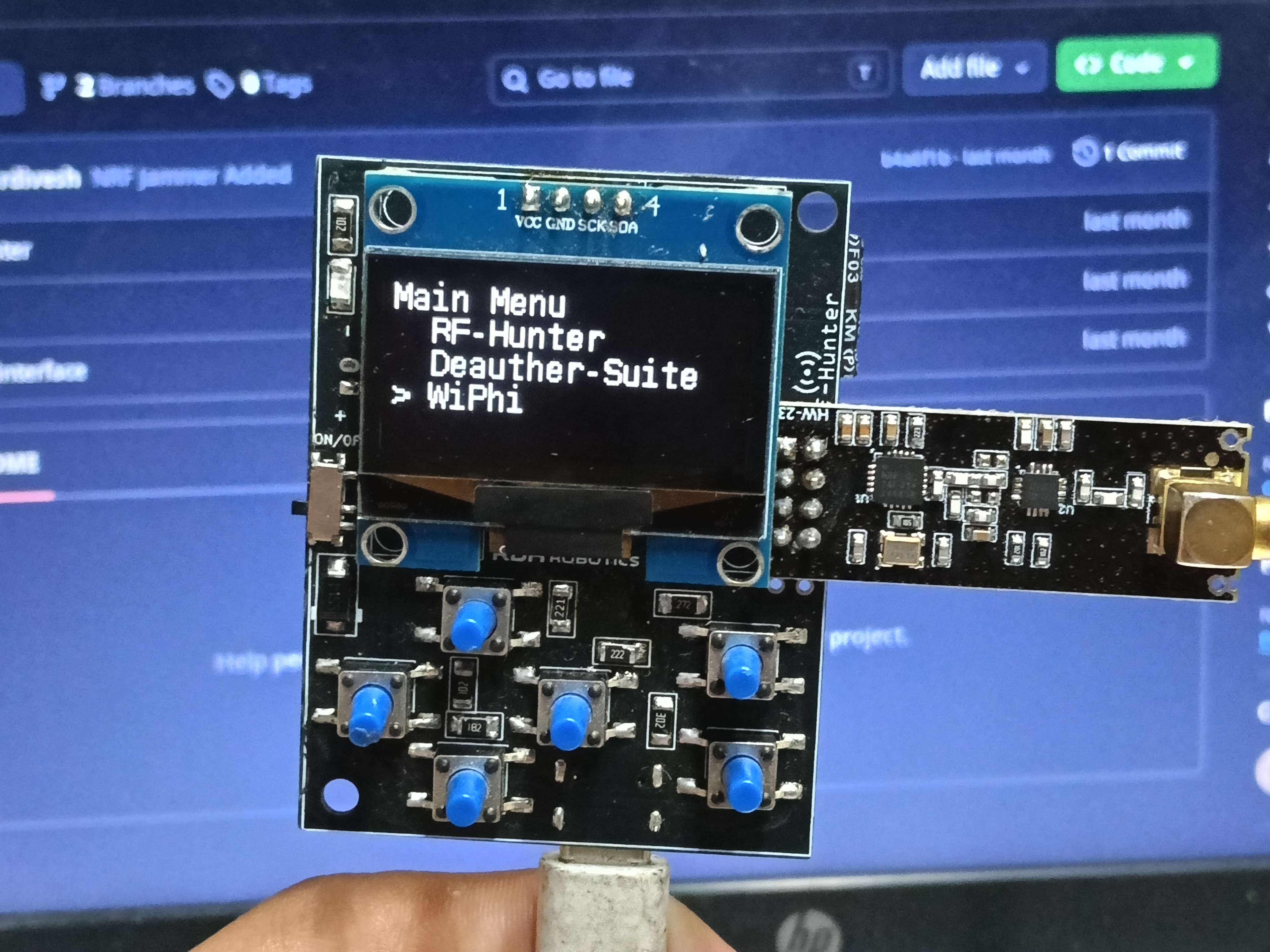 RF-Hunter OLED showing the three tool launcher interface
